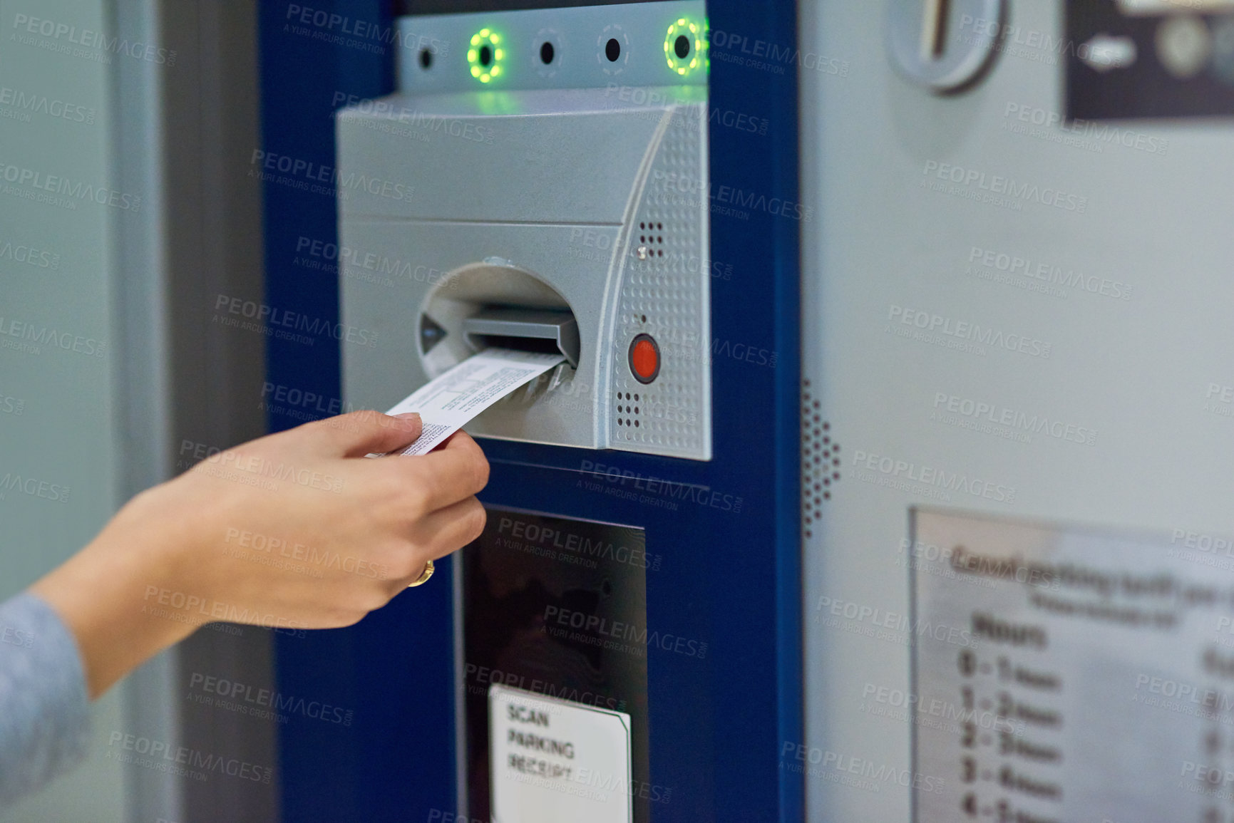 Buy stock photo Cropped shot of an unrecognizable person inserting a ticket into a meter