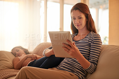 Buy stock photo Mother, relax and tablet on sofa with young girl for streaming, social media and online games for enjoyment. Daughter, sleep and woman on couch for weekend break, movies and bonding in family home.
