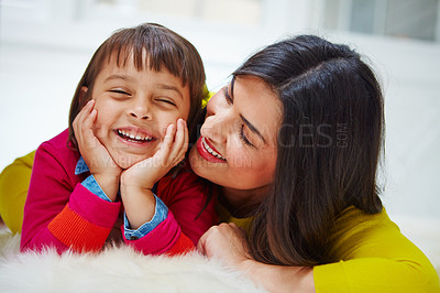 Buy stock photo Portrait of an adorable little girl and her mother bonding at home