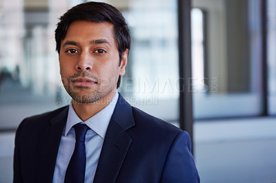 Buy stock photo Cropped portrait of a businessman standing in his office