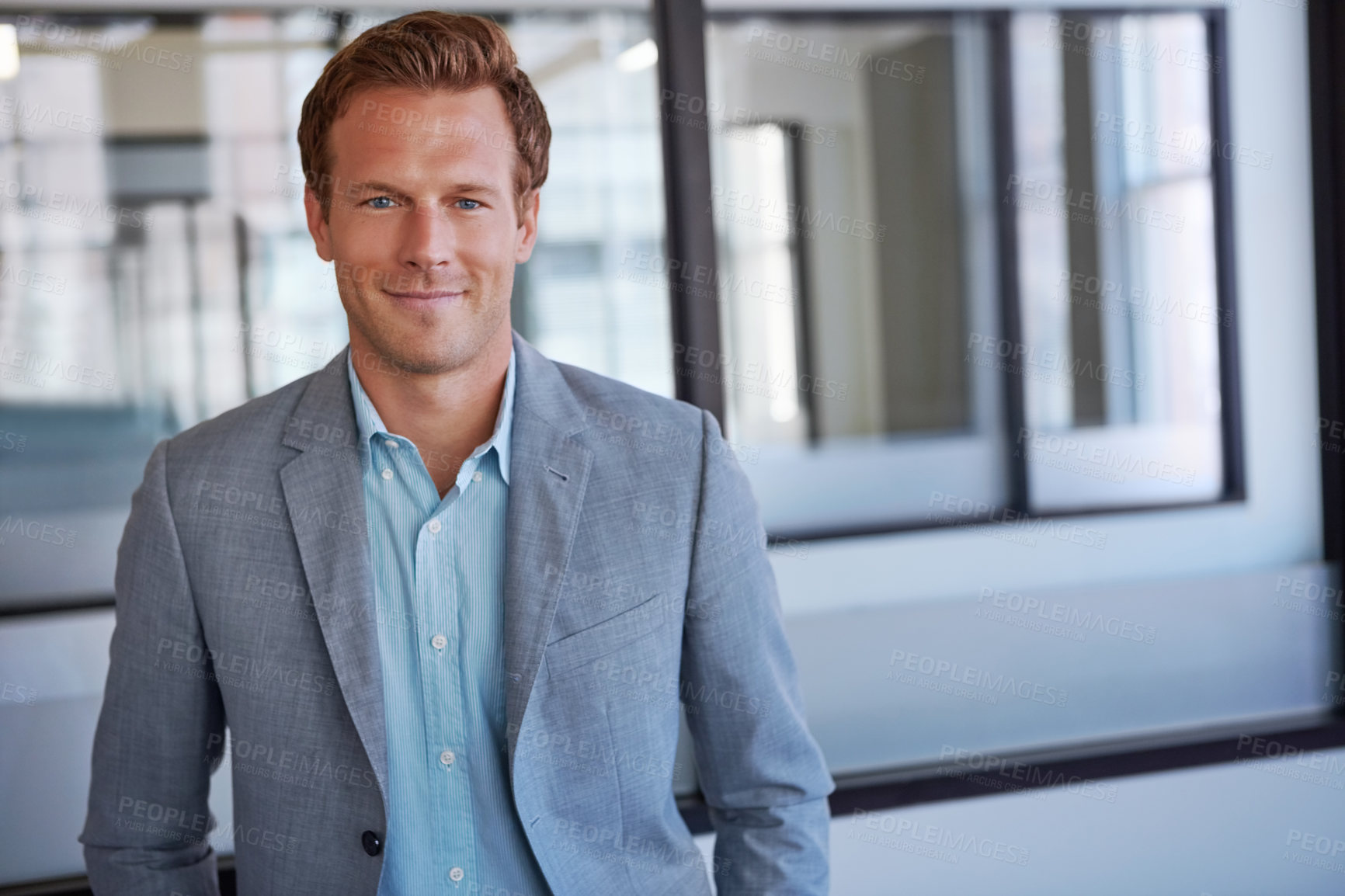 Buy stock photo Portrait of a handsome businessman in his office