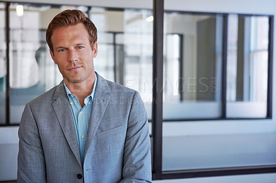 Buy stock photo Portrait of a handsome businessman in his office