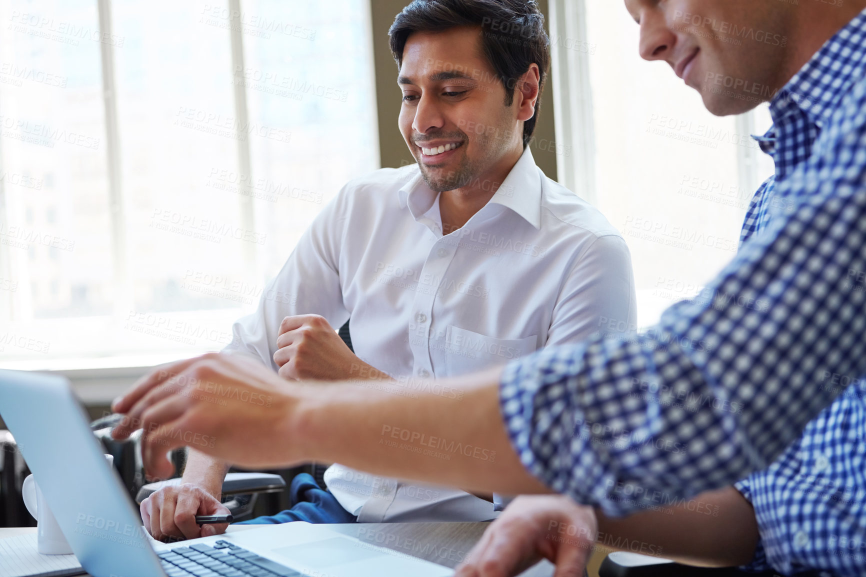 Buy stock photo Cropped shot of businessmen working in their office