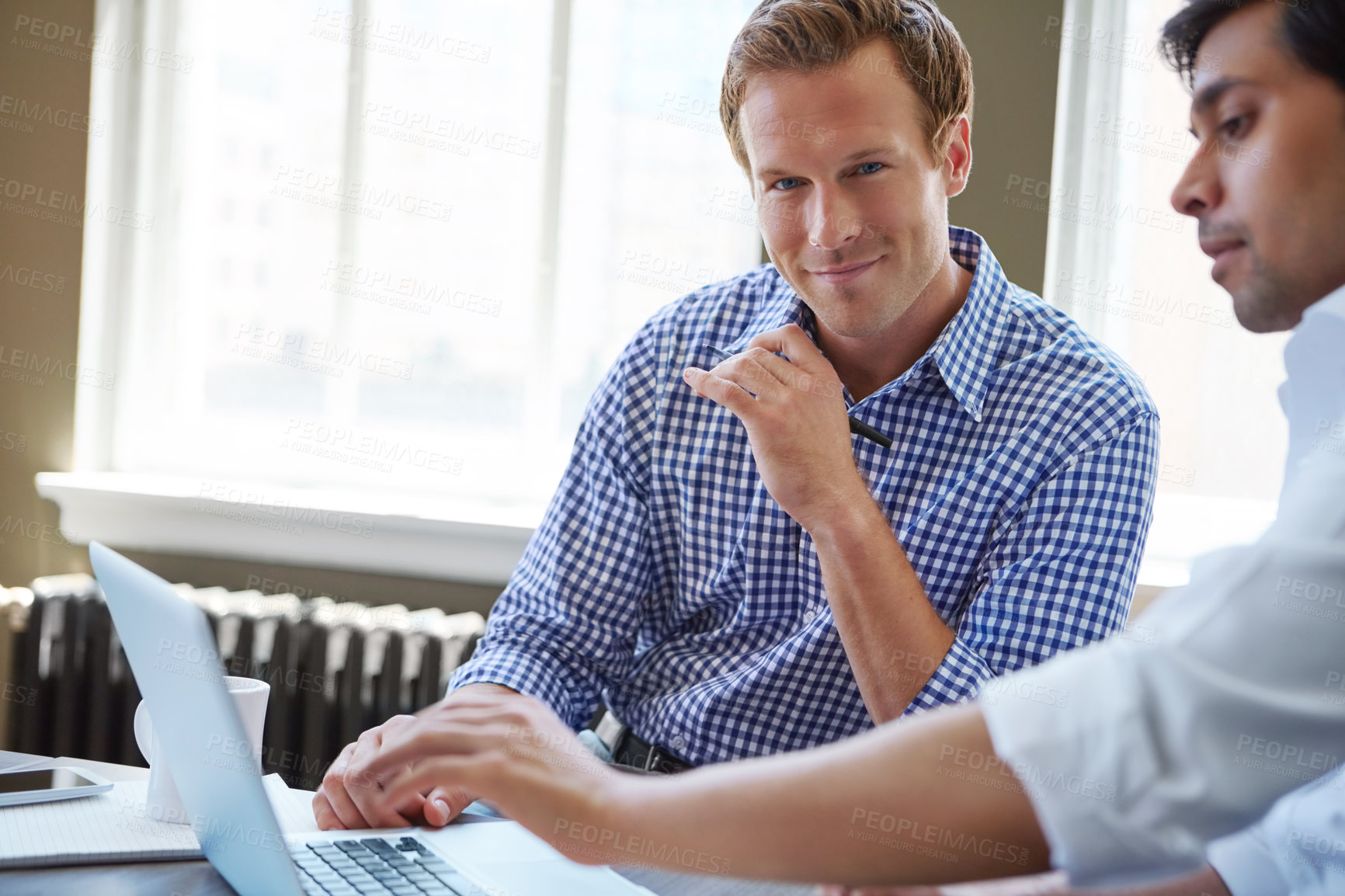 Buy stock photo Cropped shot of businessmen working in their office