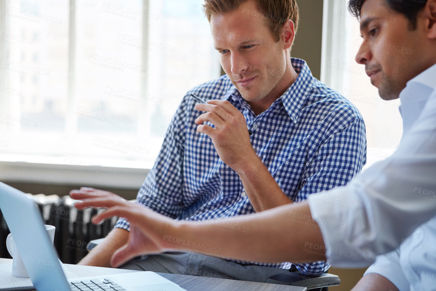 Buy stock photo Cropped shot of businessmen working in their office