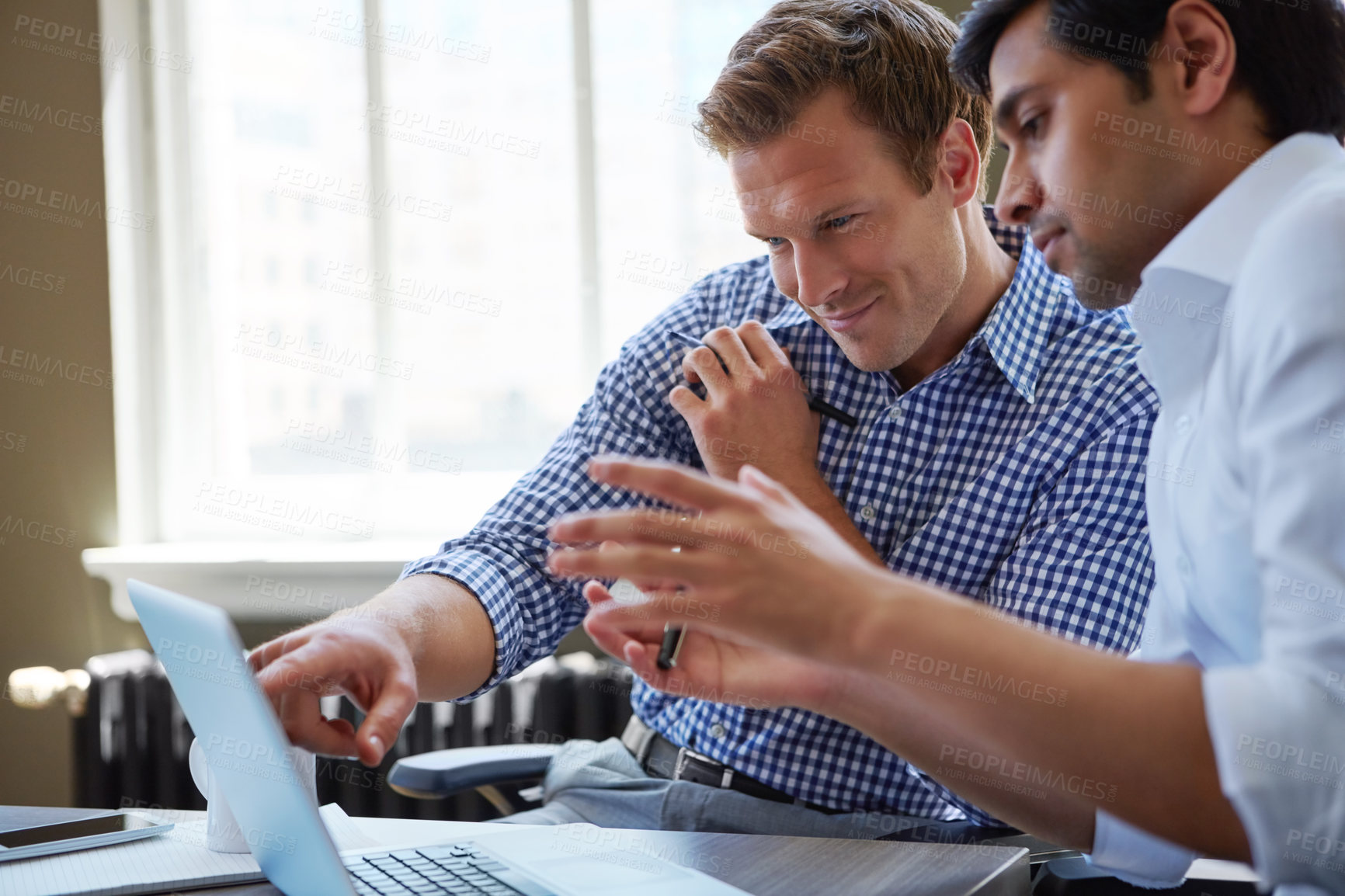 Buy stock photo Cropped shot of businessmen working in their office