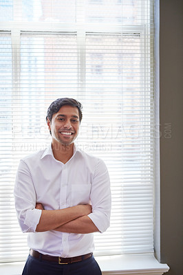 Buy stock photo Portrait of a handsome businessman in his office