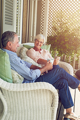 Buy stock photo Cropped shot of a senior couple sitting outdoors