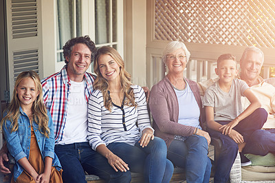 Buy stock photo Cropped portrait of a family of six sitting outside