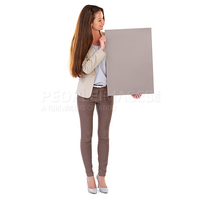 Buy stock photo Studio shot of a young businesswoman holding a blank  field of tan copyspace