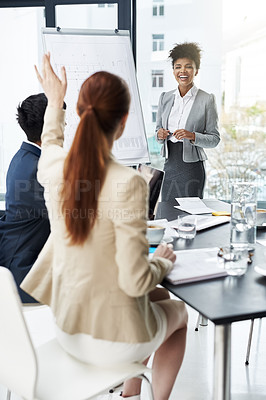 Buy stock photo Shot of a group of businesspeople attending a presentation