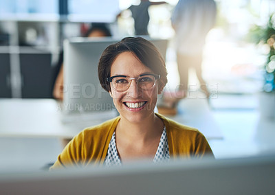 Buy stock photo Portrait of a smiling young businesswoman working in a modern office
