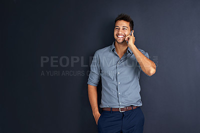 Buy stock photo Space, happy and phone call with business man in studio for communication, networking and contact. Connection, smile and conversation with male employee on dark background for mockup and technology