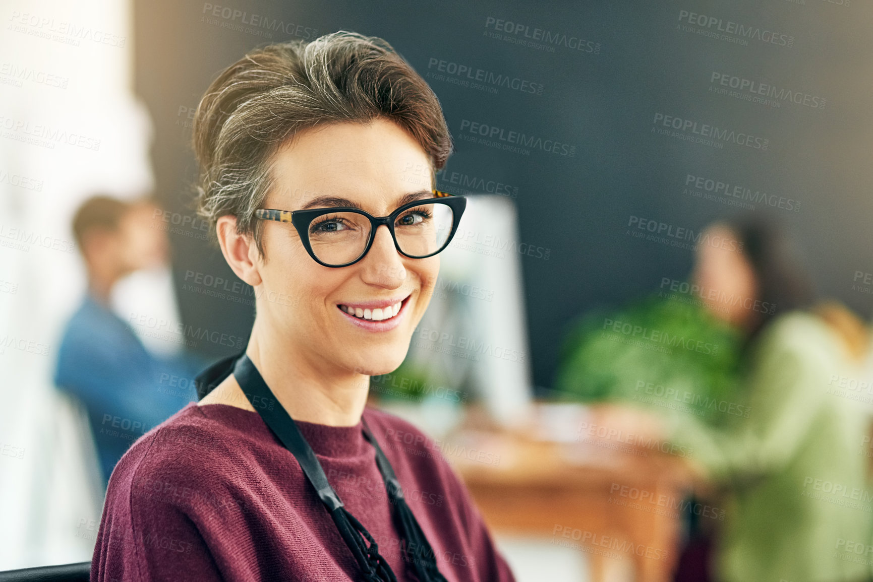 Buy stock photo Portrait of a young businesswoman sitting in a modern office