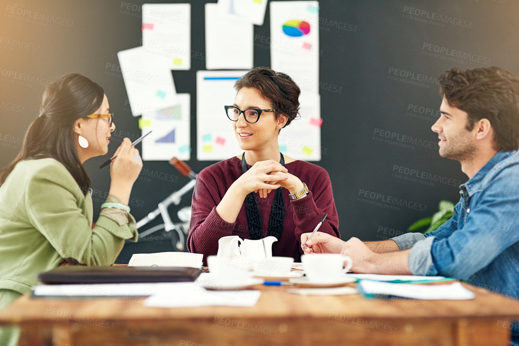 Buy stock photo Creative agency, ideas and business people in meeting, brainstorming and partnership. Group, staff and employees with teamwork, startup and cooperation with conversation for project brief and review