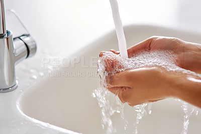 Buy stock photo Cropped shot of hands being washed at a tap
