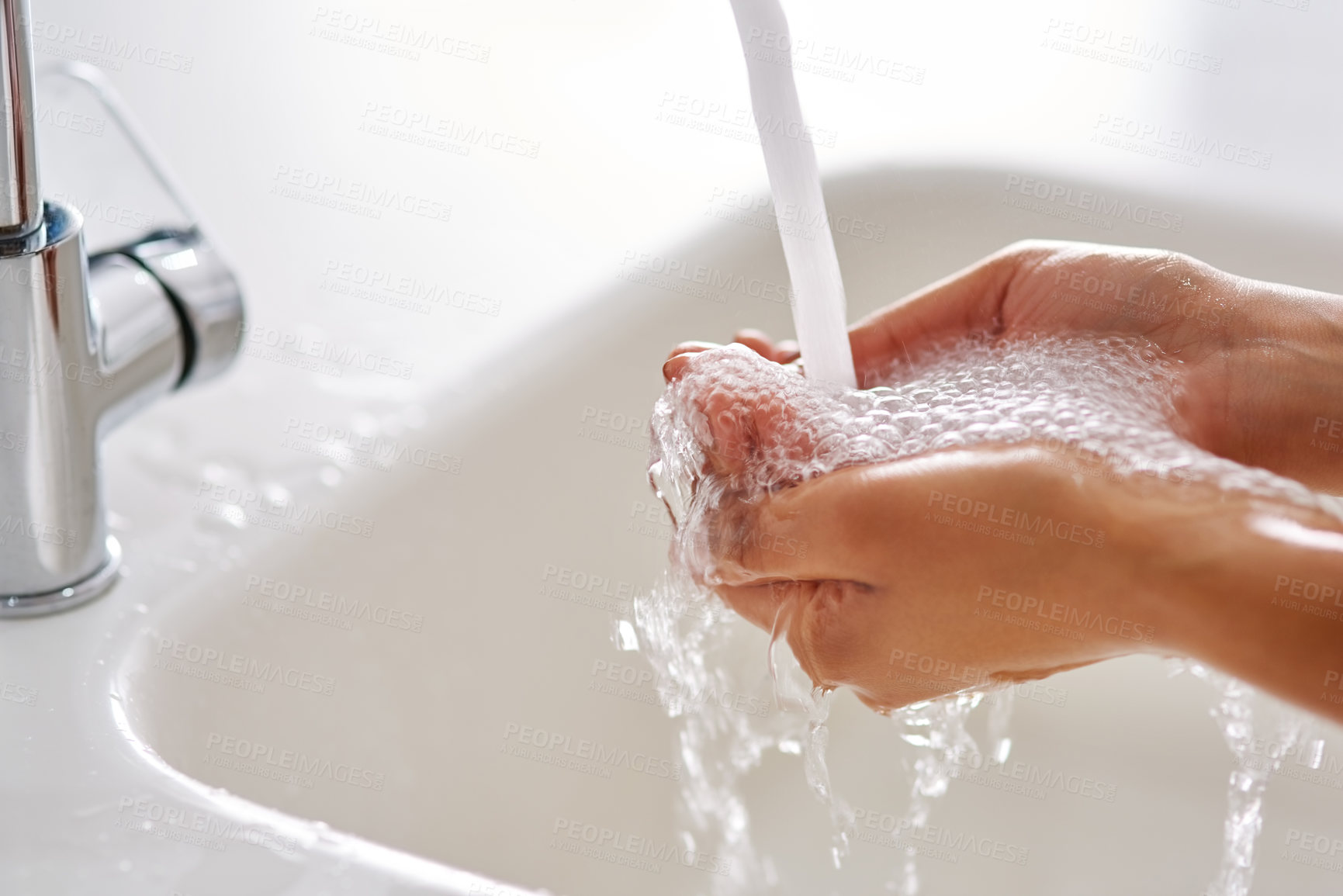 Buy stock photo Cropped shot of hands being washed at a tap