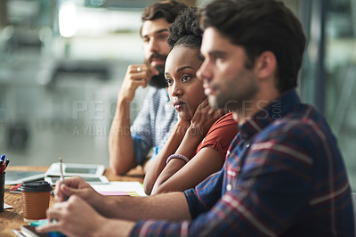 Buy stock photo Cropped shot of a creative businesswoman struggling to focus at a meeting