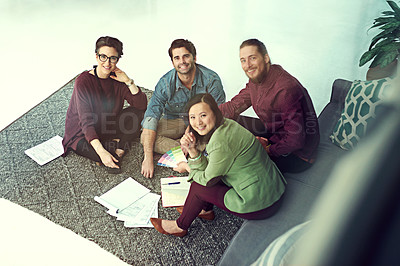 Buy stock photo Portrait of a group of young creatives having a meeting in a modern office
