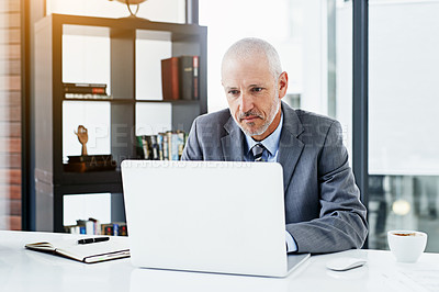 Buy stock photo Mature man, laptop and online at desk for proposal, CEO and check email or planning for growth in office. Male person, professional and market research for sale, admin and notes or info on website