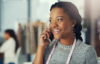 Buy stock photo Shot of a designer talking on her phone