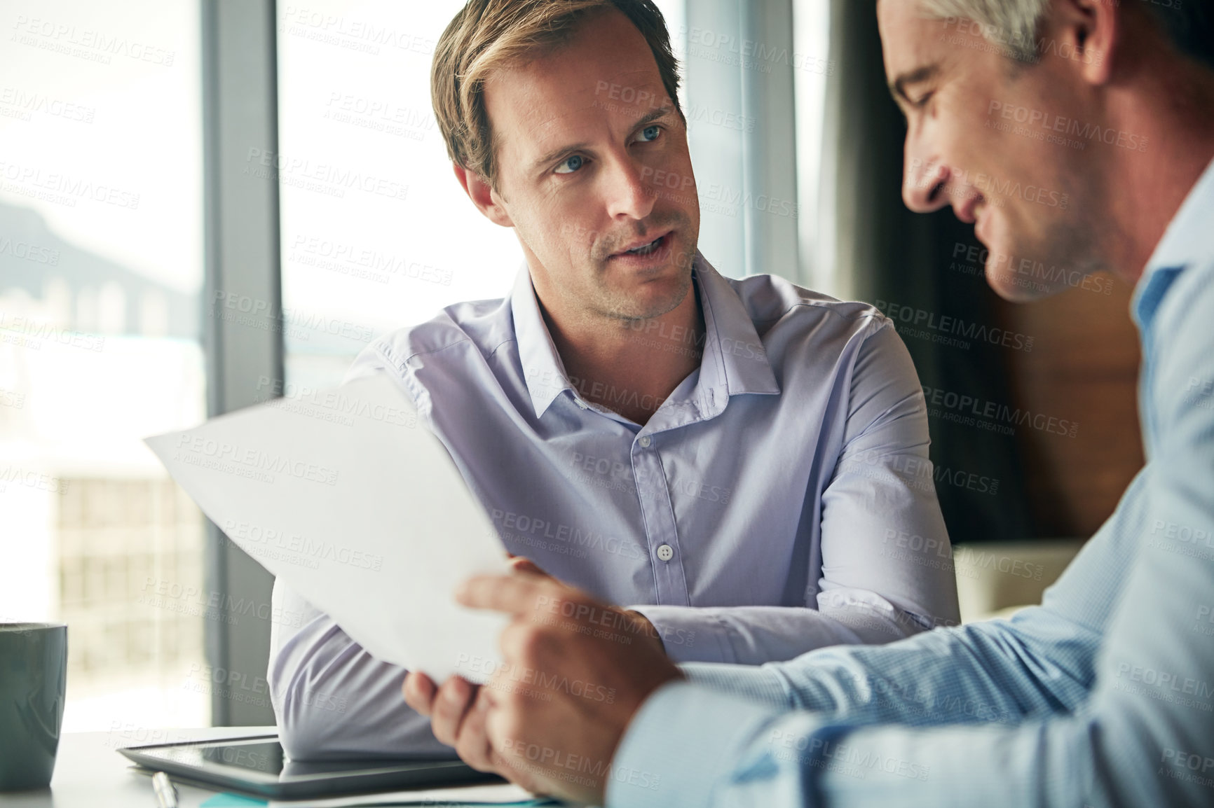 Buy stock photo Business people, paperwork and talking about planning, strategy idea or negotiation in office. Corporate men together for finance collaboration during conversation about vision for growth development