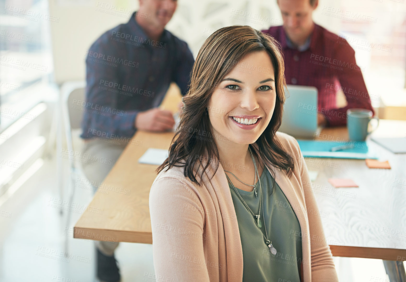 Buy stock photo Portrait of a businesswoman in a meeting with colleagues