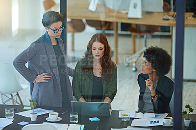 Buy stock photo Women, laptop or teamwork startup meeting for brainstorming, agency research or planning together. Glass, partnership or group of designers with discussion, collaboration and creative project ideas