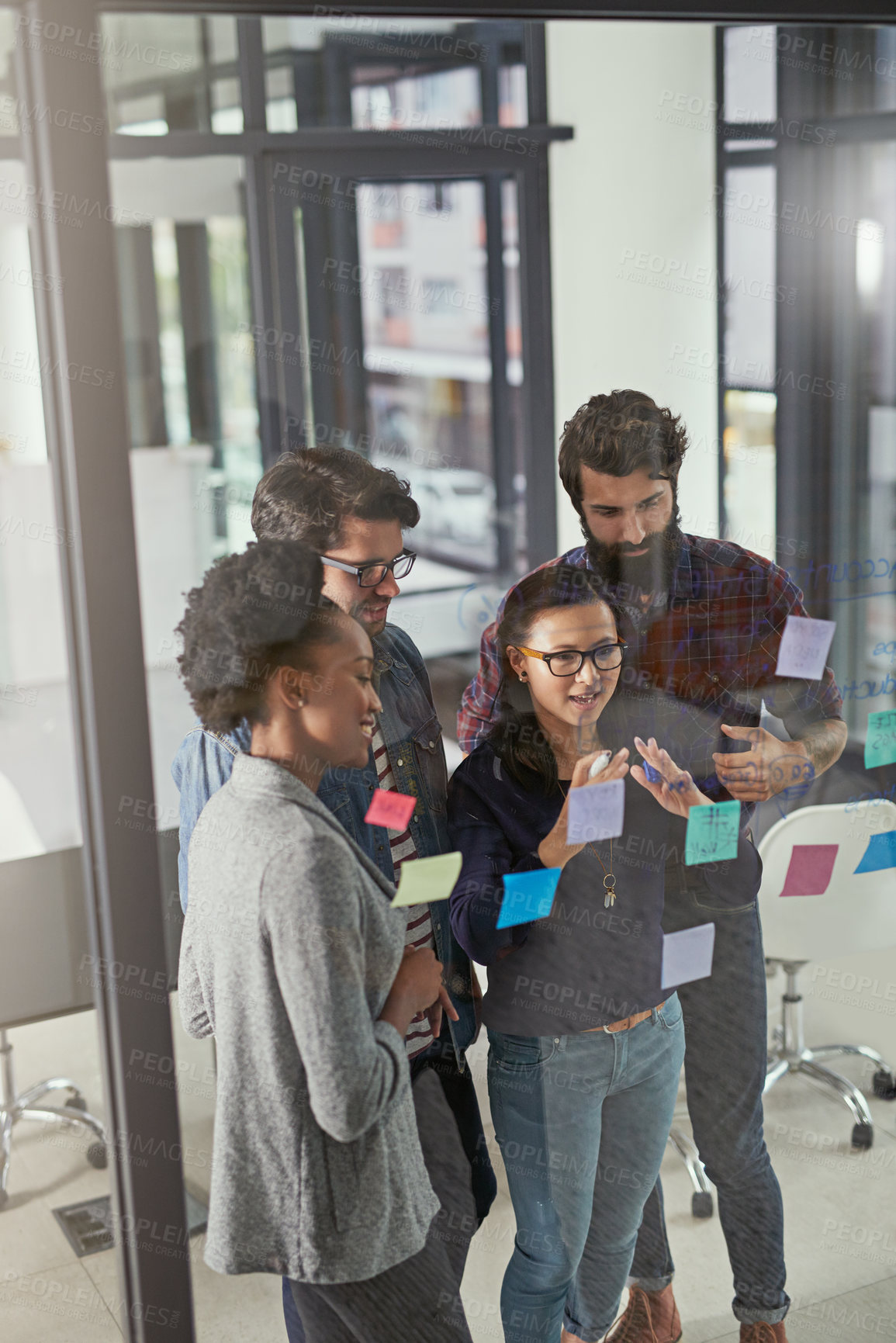 Buy stock photo Shot of creative businesspeople  having a brainstorming session