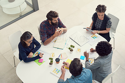 Buy stock photo Shot of a group of creative businesspeople having a meeting in an office
