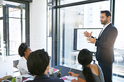Buy stock photo Man, leader and business meeting in office with collaboration, ideas or communication with employees for pitch. Male manager, presentation and teamwork with brainstorming, review and global sales