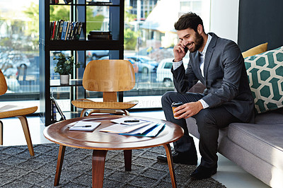 Buy stock photo Happy, businessman and phone call with coffee in modern office for business discussion or chat. Young man, employee or financial advisor talking on mobile smartphone for conversation or online advice
