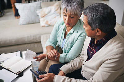 Buy stock photo Elderly couple, finance budget and life insurance discussion with banking details and bills. Retirement fund, senior people and communication in a home living room with paperwork and contract