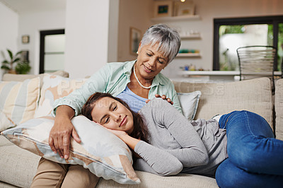 Buy stock photo Mother, checks and comforts woman in home for love, family or sharing moment together on sofa. People, happy and embracing in living room couch for bonding, connection and relationship growth