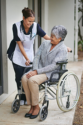 Buy stock photo Senior woman and wheelchair at nursing home with nurse for assistance with disability, help at clinic. Disabled patient or medical or outdoors for talk or plan for healthcare, conversation with carer