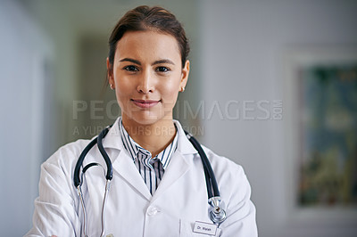 Buy stock photo Portrait of a confident young doctor at work