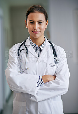 Buy stock photo Woman, portrait and doctor with arms crossed in hospital, clinic and wellness facility with confidence in medical career. Female person, cardiologist and happy healthcare professional in Colombia