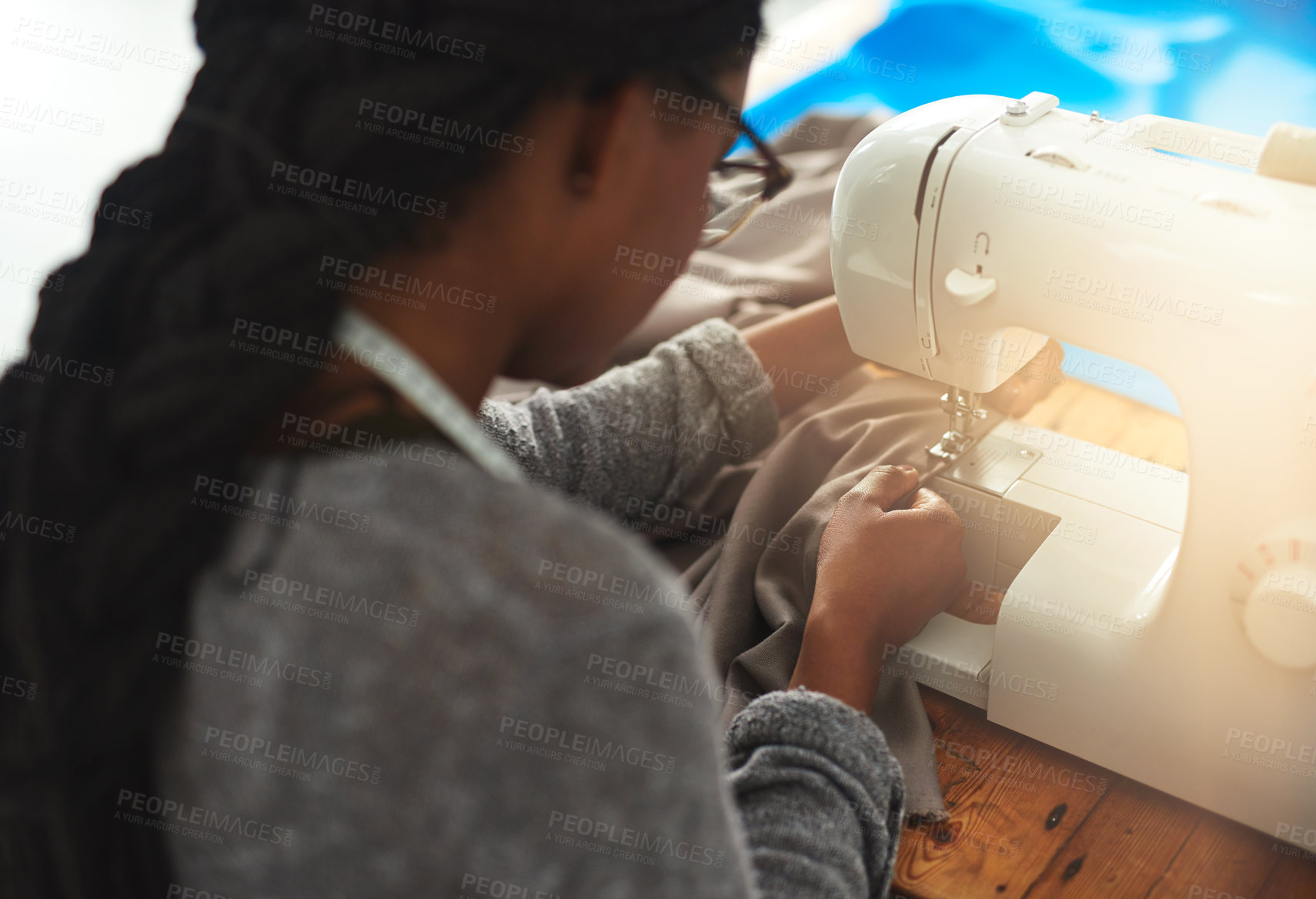 Buy stock photo Sewing, machine and woman with tailor job, designer and manufacturing work for boutique clothes. Fashion, back and creativity of seamstress with dress, construction and textile pattern at workshop