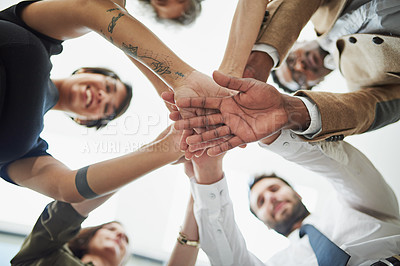Buy stock photo Teamwork, business people and hands together for support, cooperation and celebration or victory in workplace. Collaboration, solidarity and employees as workforce, success and trust in low angle