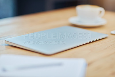 Buy stock photo Laptop, coffee and paperwork on desk in workplace for crypto, stock market and e commerce. Technology, documents and research in office space for start up company, website and digital development 