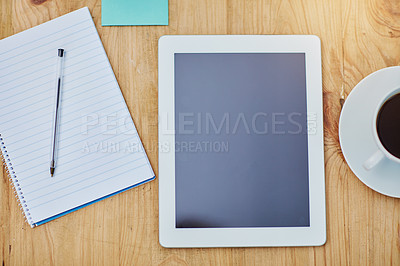 Buy stock photo High angle, desk and tablet or paper in zoom with coffee, workspace with technology for background. Notebook, epad and above on table with drink in closeup, internet or app for marketing business