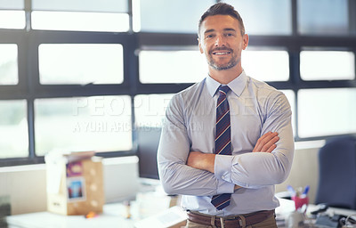 Buy stock photo Portrait of a businessman standing confidently in his office