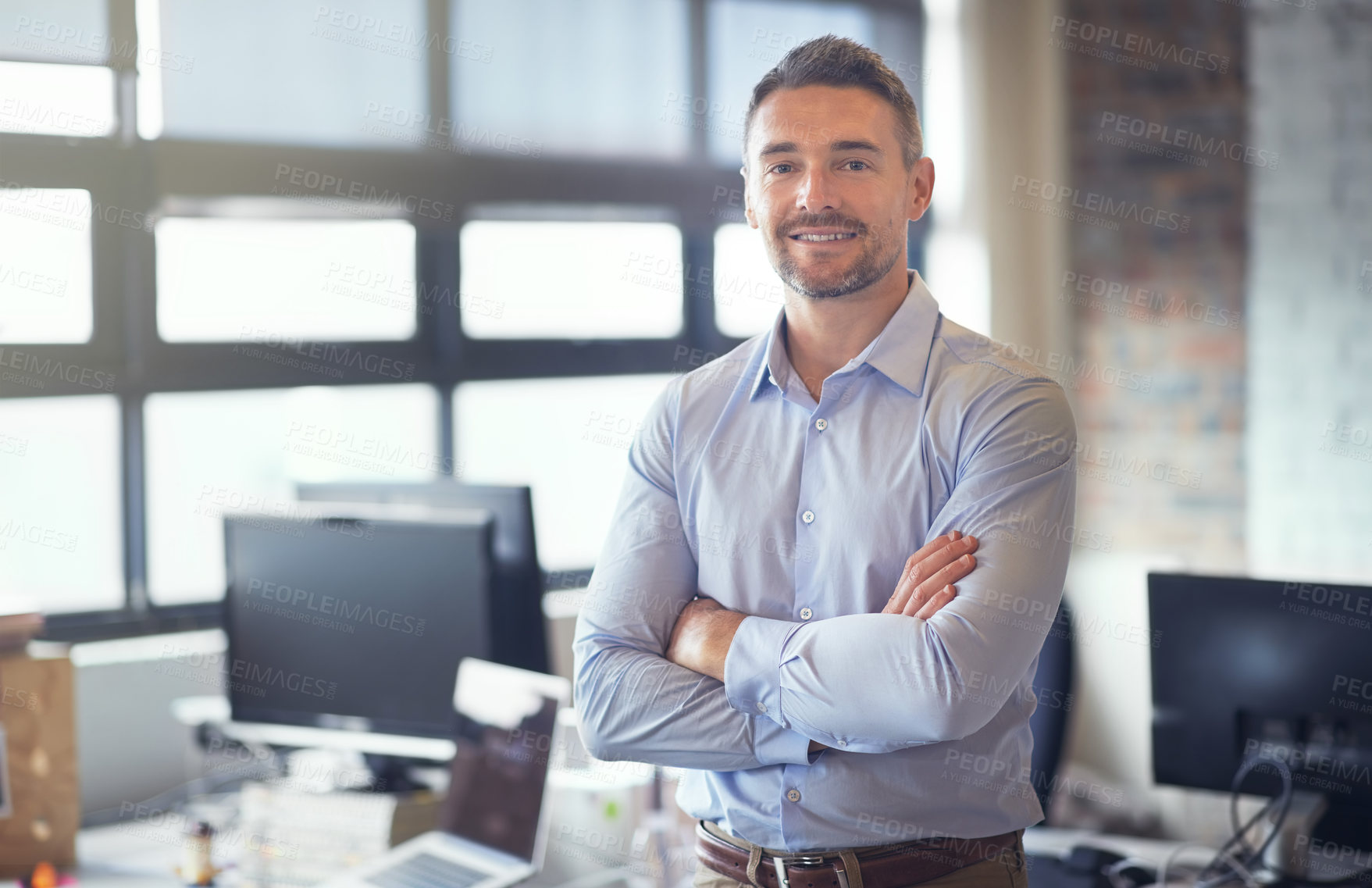 Buy stock photo Portrait, confidence and happy businessman in office with company experience, smile and pride for career. Face, arms crossed and mature expert manager, professional and financial broker in Finland