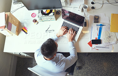 Buy stock photo Above, man and typing at laptop screen for creativity, design process or article writing in office. Editor, computer or connectivity in agency for research, story development or networking at desk