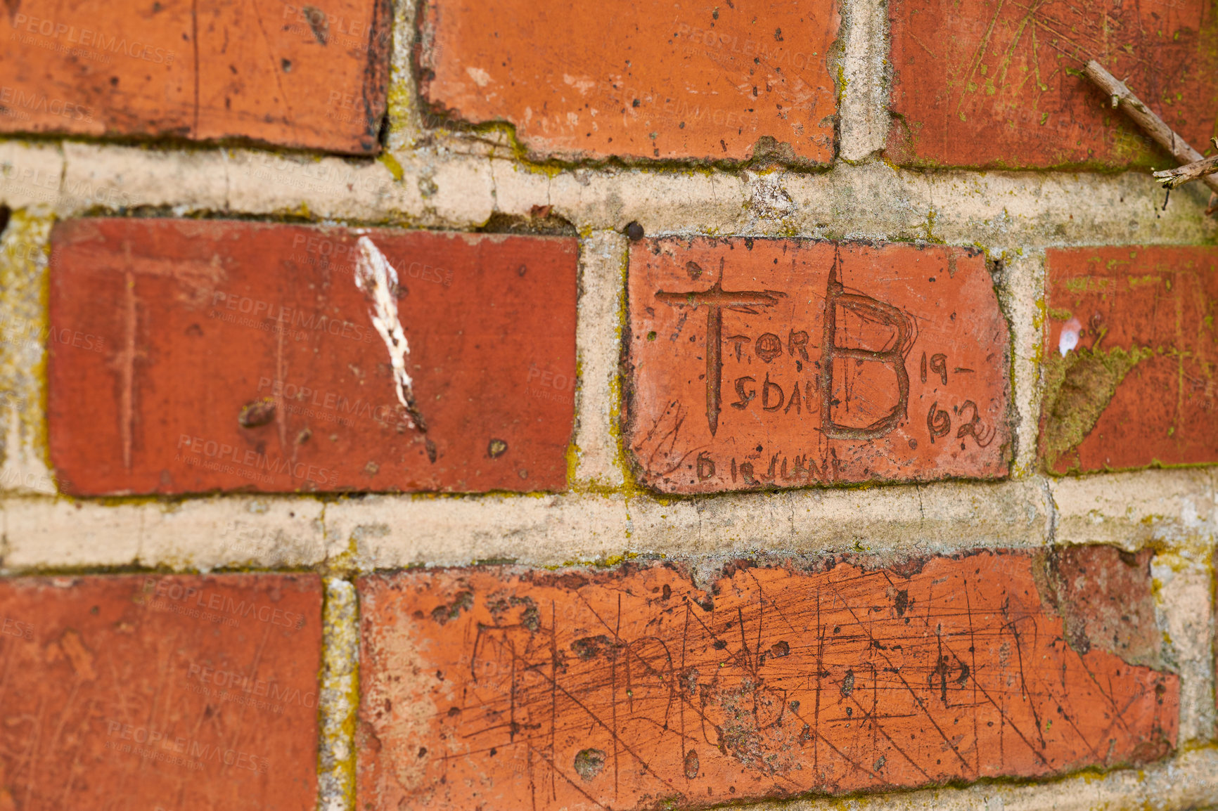 Buy stock photo Graffiti, writing and scratch on brick wall of building in city for background, pattern and exterior design. Construction, architecture and closeup of words or texture on stone, concrete and cement