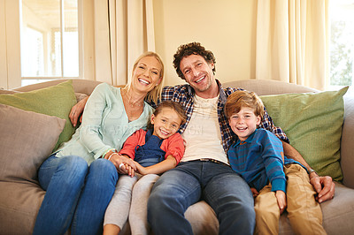 Buy stock photo Portrait of a happy family spending quality time together at home
