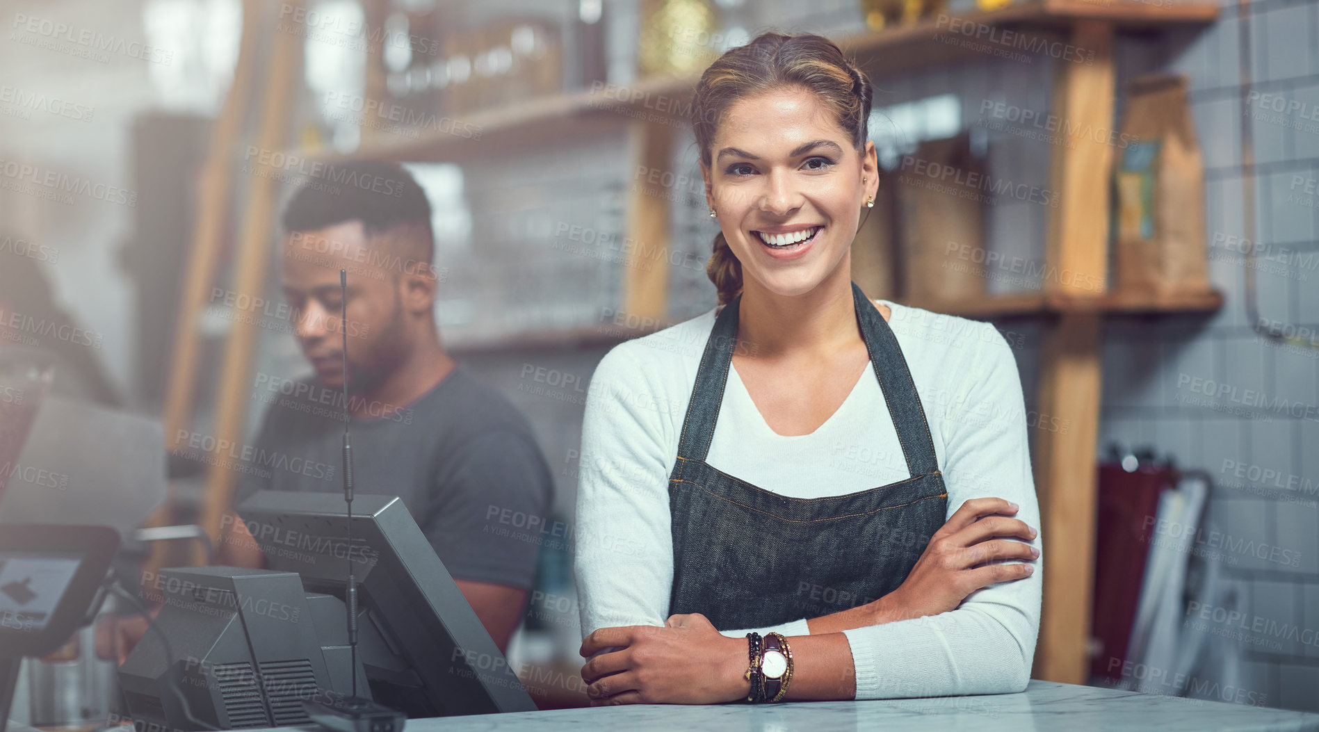 Buy stock photo Portrait of a young woman working behind the counter of her store