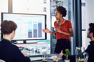 Buy stock photo Cropped shot of a young businesswoman giving a presentation in the boardroom