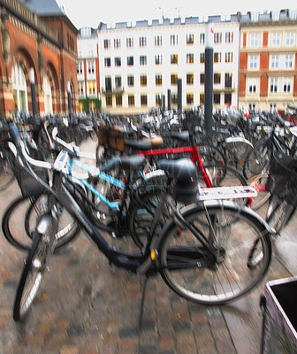 Buy stock photo Bike, parking rack and city in street with row for eco friendly travel, security and sustainability with blur. Bicycle, road or urban sidewalk with transportation, carbon footprint and outdoor in USA