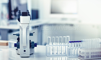 Buy stock photo Closeup of microscope, test tubes and pipettes or droppers in medical, science or chemistry laboratory. Empty glass vials for monkeypox, ebola or marburg virus testing, examining and discovering cure